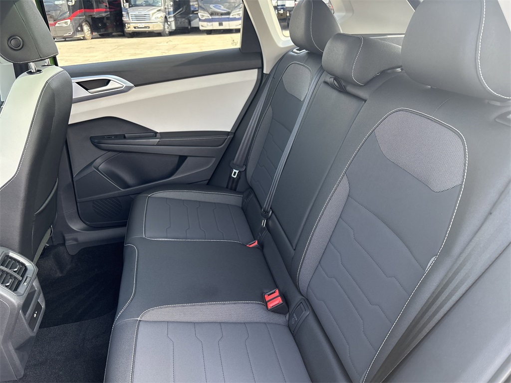 2025 Volkswagen Taos 1.5T SE Green at DeMontrond Auto Country