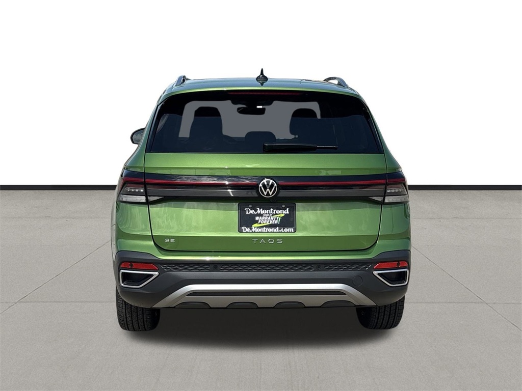 2025 Volkswagen Taos 1.5T SE Green at DeMontrond Auto Country