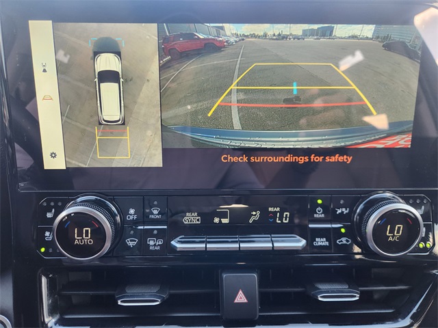 2025 Toyota Highlander Hybrid Limited Silver at Community Toyota