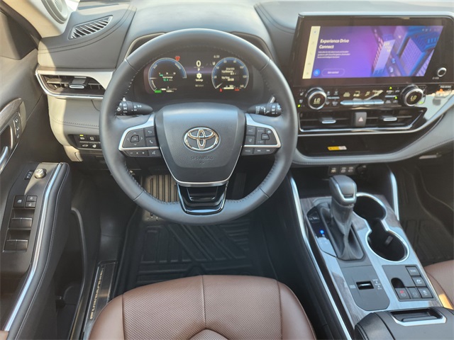 2025 Toyota Highlander Hybrid Limited Silver at Community Toyota