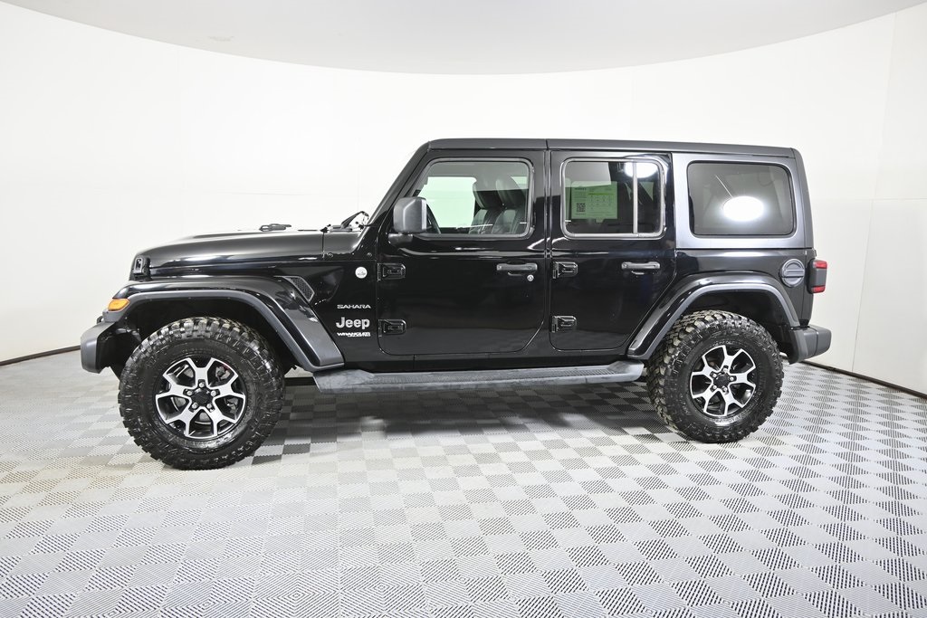 Used 2019 Jeep Wrangler Unlimited Sahara with VIN 1C4HJXEN7KW524064 for sale in Forest Lake, Minnesota