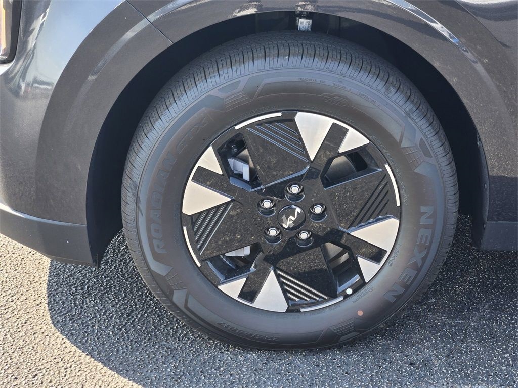 2026 Kia Carnival Hybrid LXS Gray at Shottenkirk Kia Fort Bend