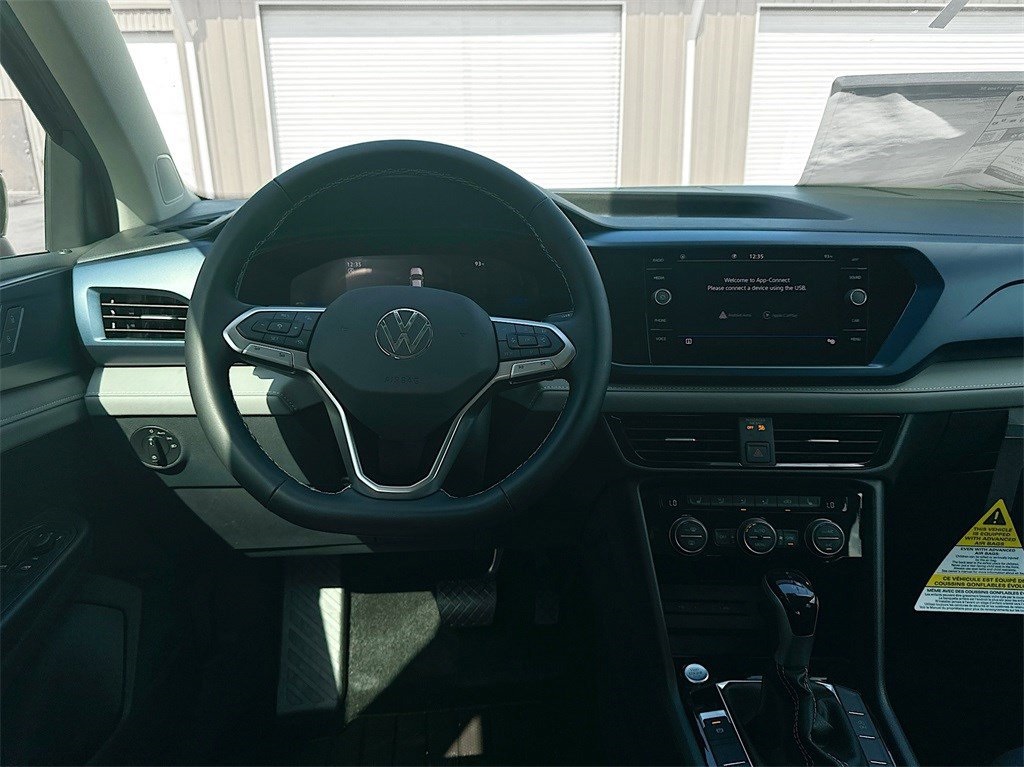 2024 Volkswagen Taos 1.5T SE Black at DeMontrond Automotive Group