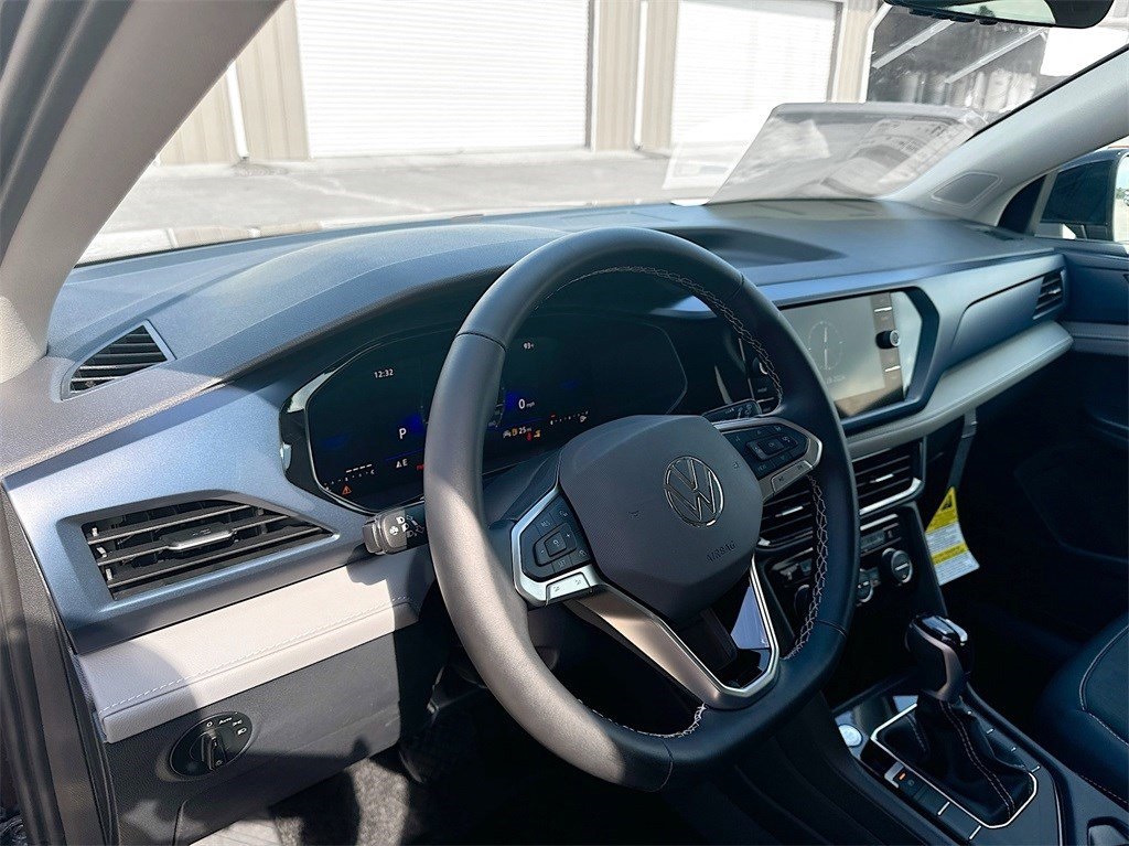 2024 Volkswagen Taos 1.5T SE Black at DeMontrond Automotive Group