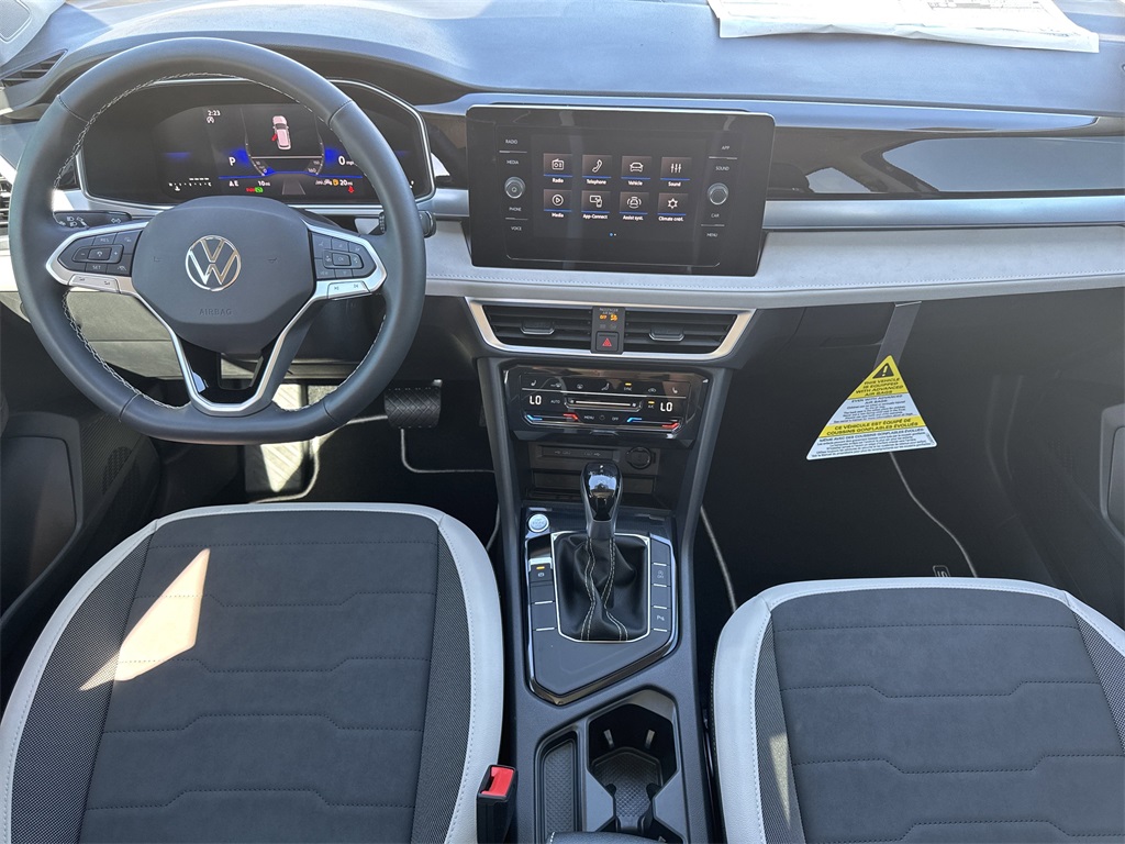 2025 Volkswagen Taos 1.5T SE Black at DeMontrond Auto Country