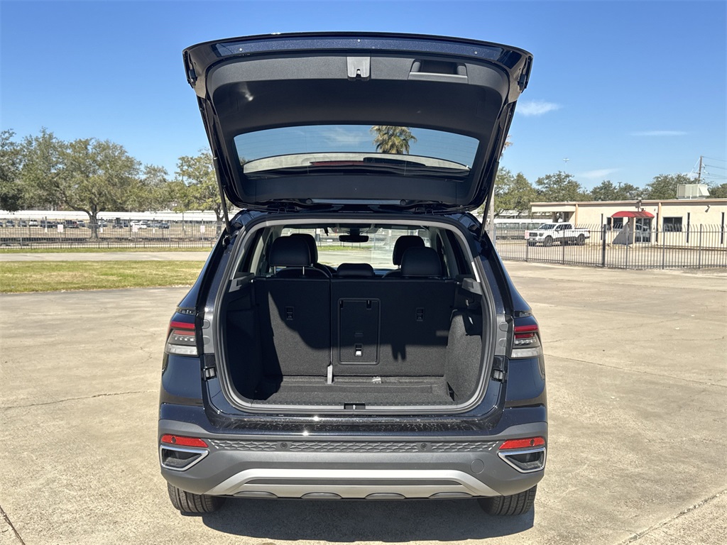 2025 Volkswagen Taos 1.5T SE Black at DeMontrond Auto Country