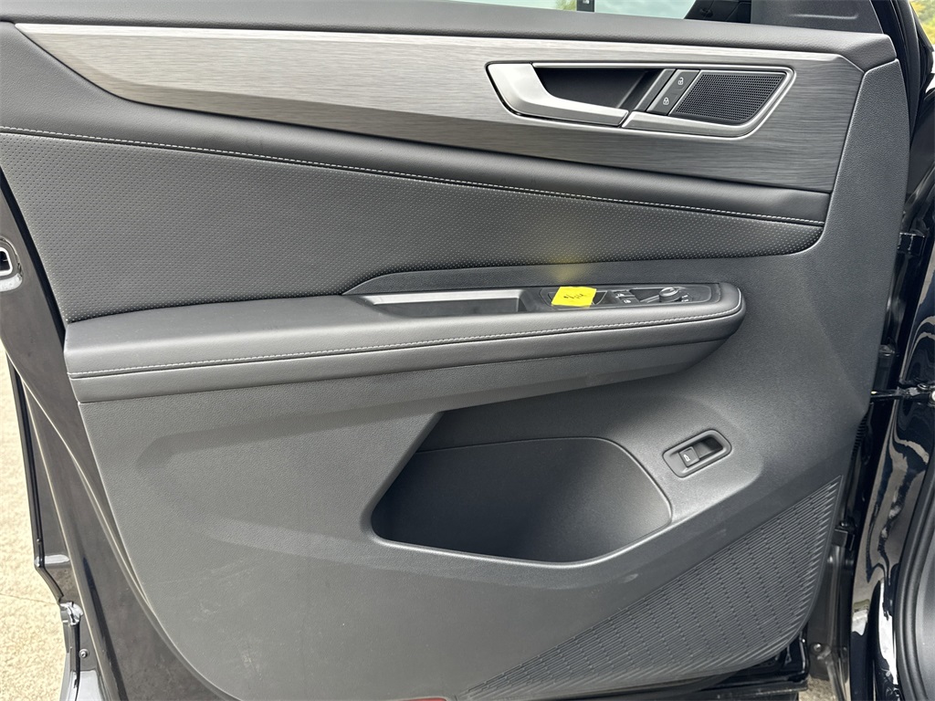 2025 Volkswagen Atlas Cross Sport 2.0T SE w/Technology Black at DeMontrond Automotive Group