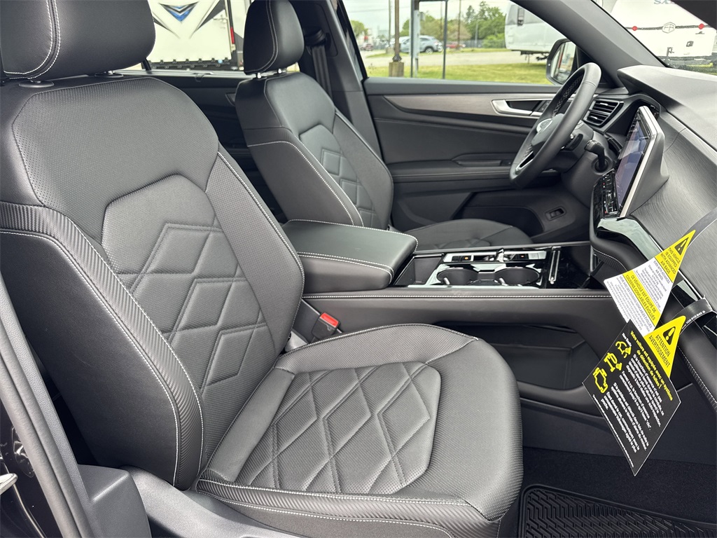 2025 Volkswagen Atlas Cross Sport 2.0T SE w/Technology Black at DeMontrond Automotive Group