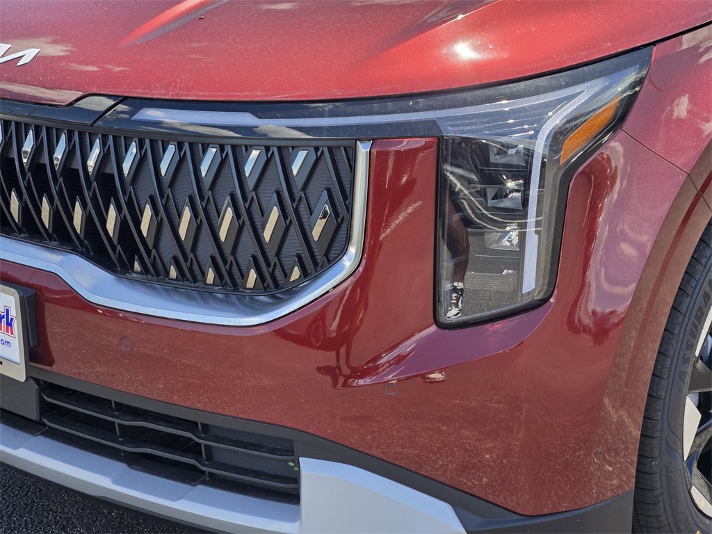 2026 Kia Carnival EX Red at DeMontrond Automotive Group