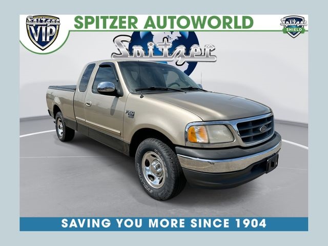 Harvest Gold Clearcoat Metallic 2000 Ford F-150 XLT Extended Cab SB Pickup Truck Rear-Wheel Drive Automatic