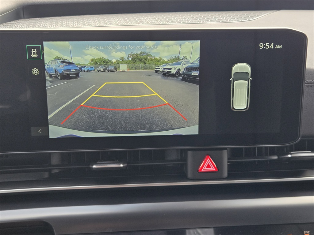 2026 Kia Carnival Hybrid LXS White at Shottenkirk Kia Fort Bend