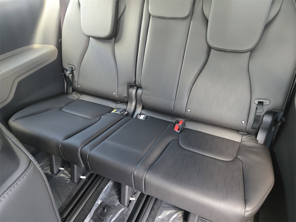 2026 Kia Carnival Hybrid LXS White at Shottenkirk Kia Fort Bend