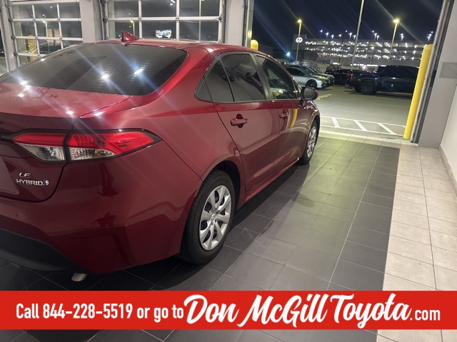 2024 Toyota Corolla Hybrid LE Red at DeMontrond Automotive Group