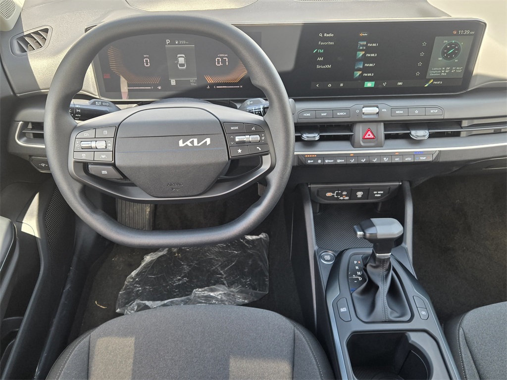 2025 Kia K4 LXS White at Shottenkirk Kia Fort Bend