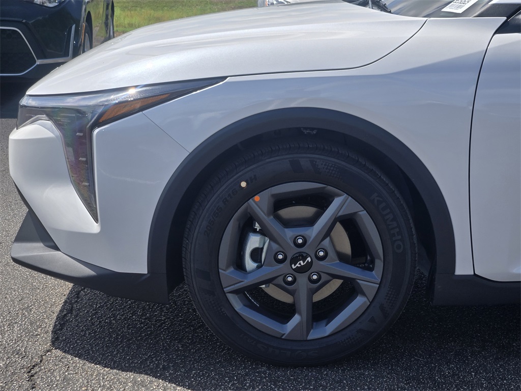 2025 Kia K4 LXS White at Shottenkirk Kia Fort Bend