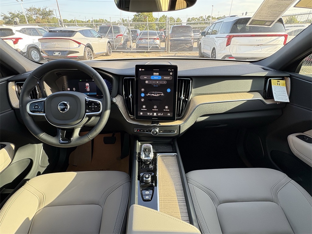 2026 Volvo XC60 B5 Core White at DeMontrond Automotive Group