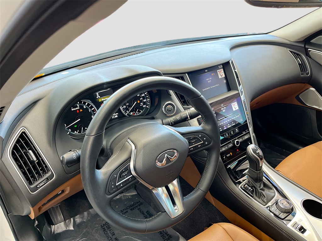 2024 INFINITI Q50 LUXE White at AutoSavvy Houston Southwest