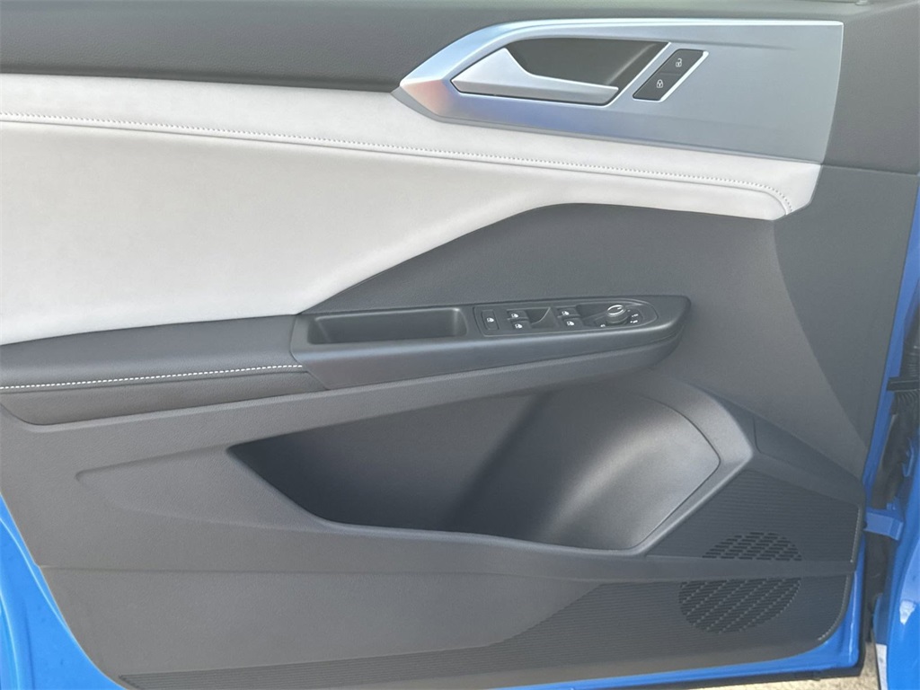 2025 Volkswagen Taos 1.5T SE Blue at DeMontrond Auto Country
