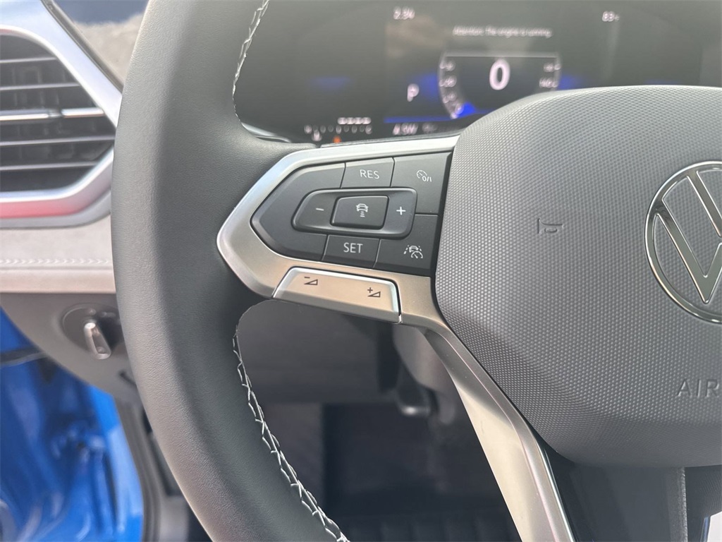 2025 Volkswagen Taos 1.5T SE Blue at DeMontrond Auto Country