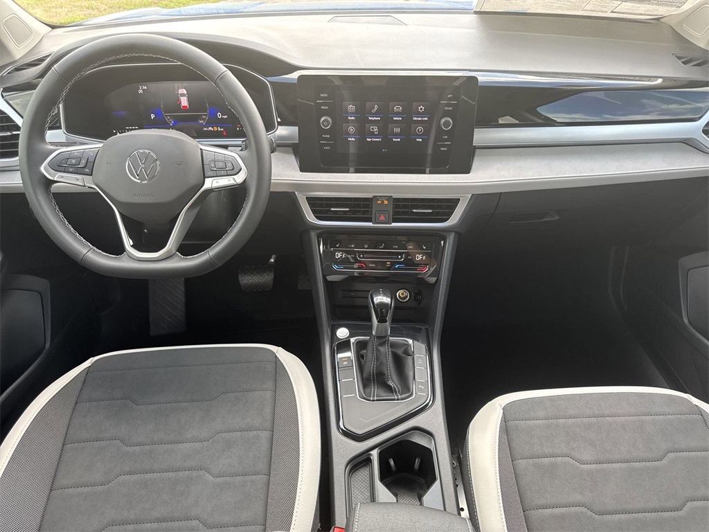 2025 Volkswagen Taos 1.5T SE Blue at DeMontrond Auto Country