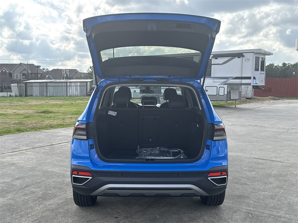 2025 Volkswagen Taos 1.5T SE Blue at DeMontrond Auto Country