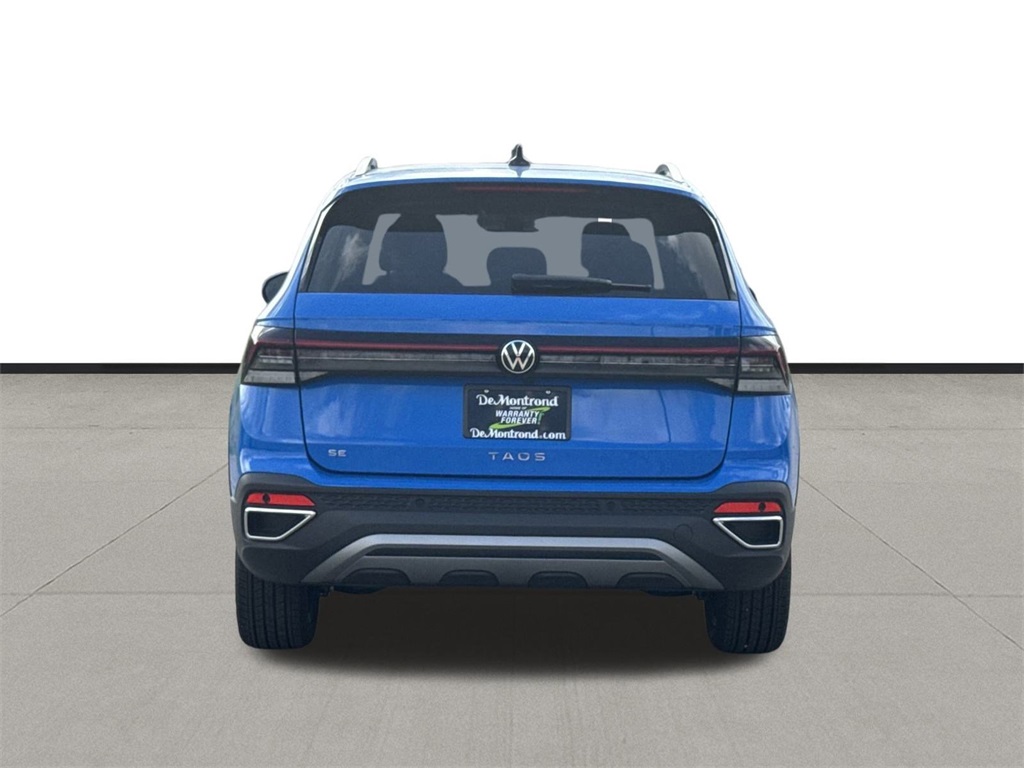 2025 Volkswagen Taos 1.5T SE Blue at DeMontrond Auto Country