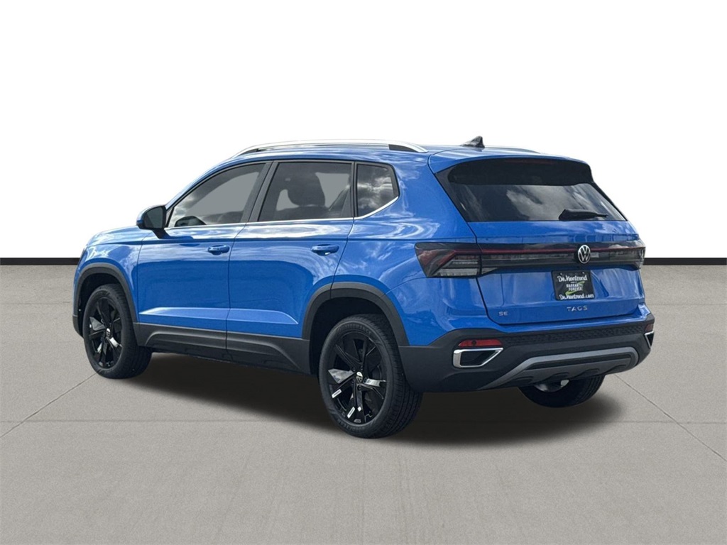2025 Volkswagen Taos 1.5T SE Blue at DeMontrond Auto Country