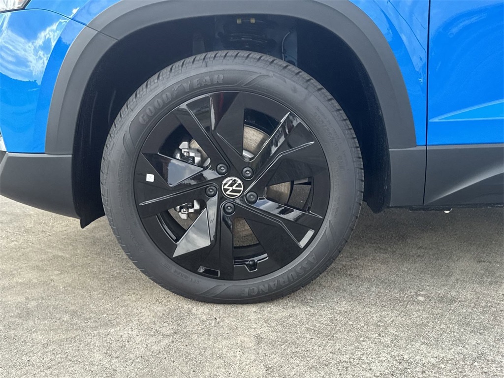 2025 Volkswagen Taos 1.5T SE Blue at DeMontrond Auto Country