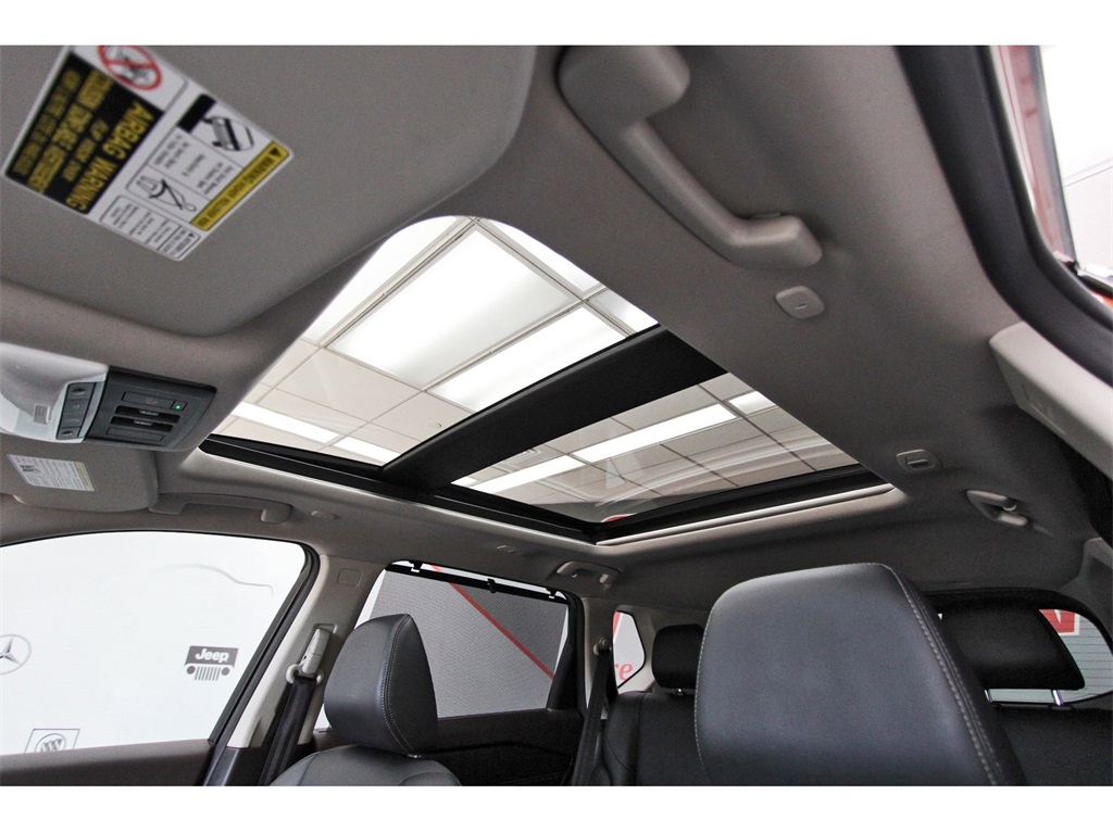 2022 Nissan Rogue SL Orange at Bayway Cadillac of The Woodlands