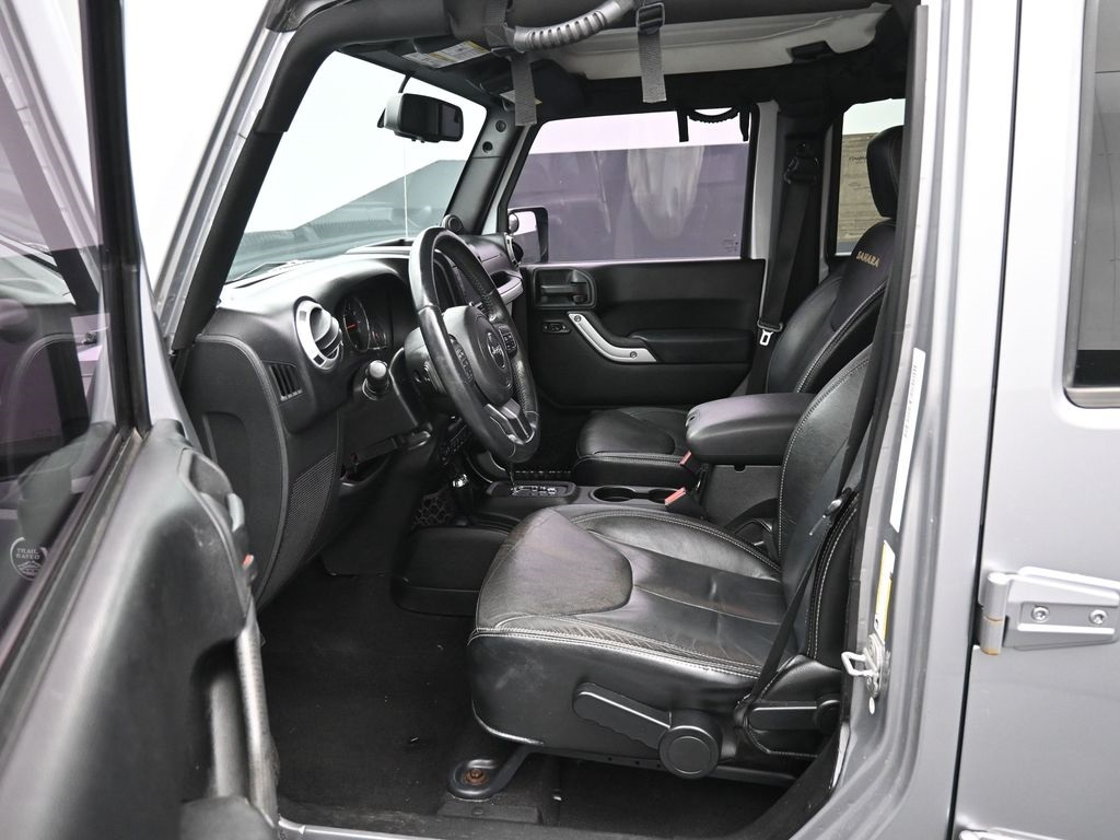 Used 2013 Jeep Wrangler Unlimited Sahara with VIN 1C4BJWEG3DL625107 for sale in Kansas City