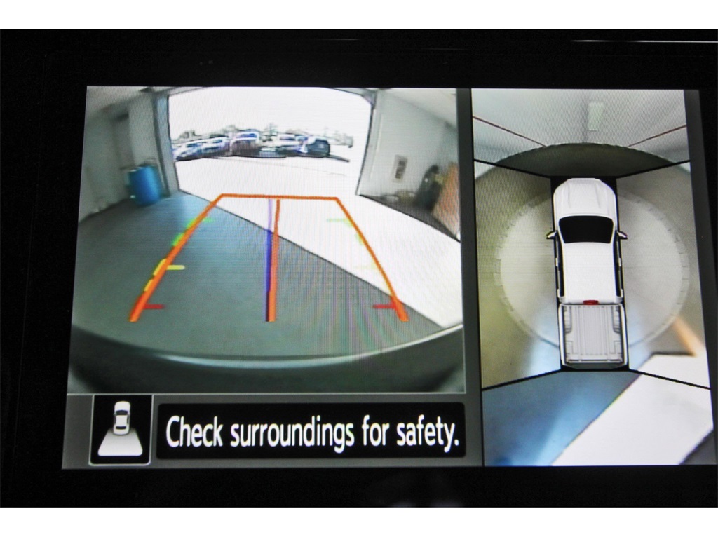 2025 Nissan Frontier PRO-4X Orange at Central Houston Nissan