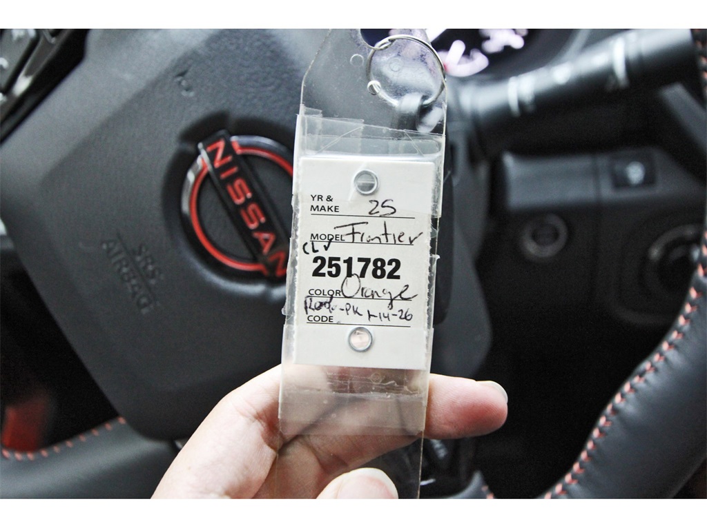 2025 Nissan Frontier PRO-4X Orange at Central Houston Nissan