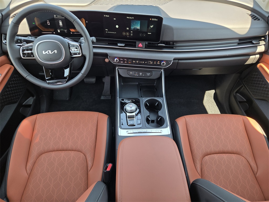 2026 Kia Carnival Hybrid EX Blue at Shottenkirk Kia Fort Bend