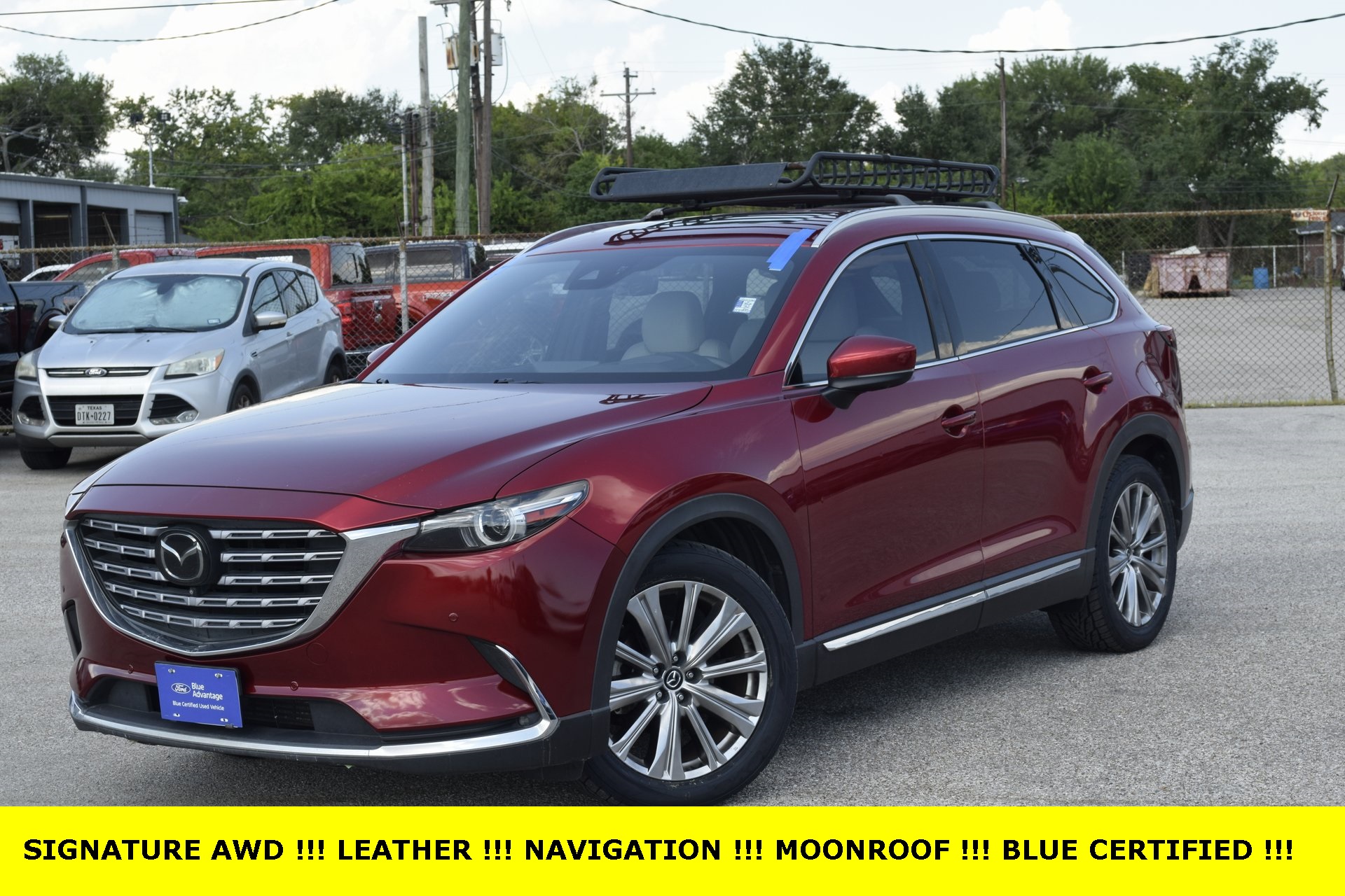 2021 Mazda CX-9 Signature Red at DeMontrond Mazda