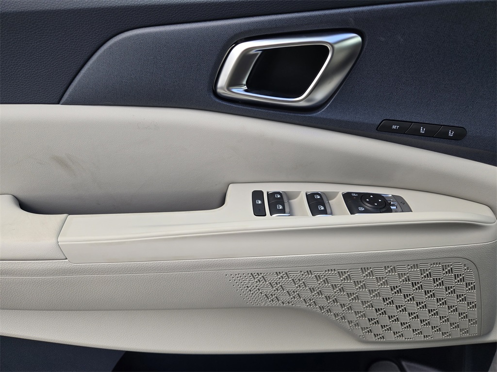 2026 Kia Carnival Hybrid EX Silver at Shottenkirk Kia Fort Bend