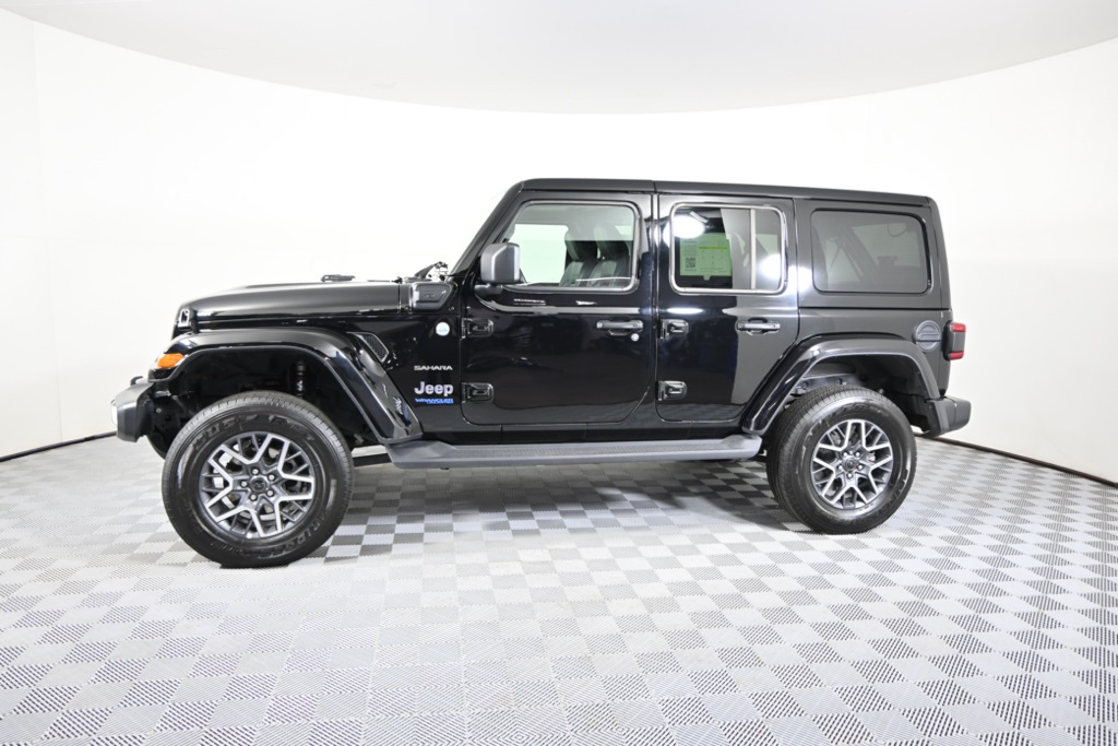 Used 2021 Jeep Wrangler Unlimited Sahara 4XE with VIN 1C4JJXP62MW839378 for sale in Minnetonka, Minnesota