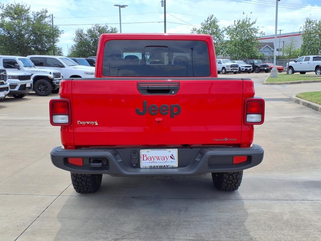 2025 Jeep Gladiator Texas Trail Red at River Oaks CDJR