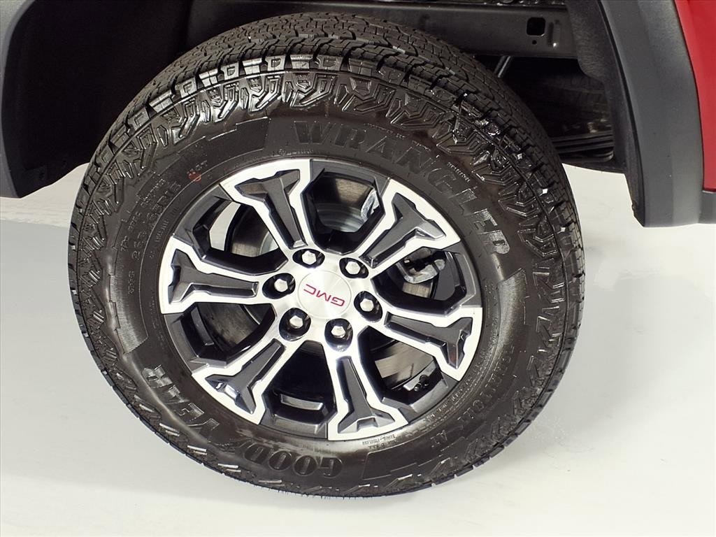 2025 GMC Canyon AT4 Red at AutoSavvy Houston Northwest