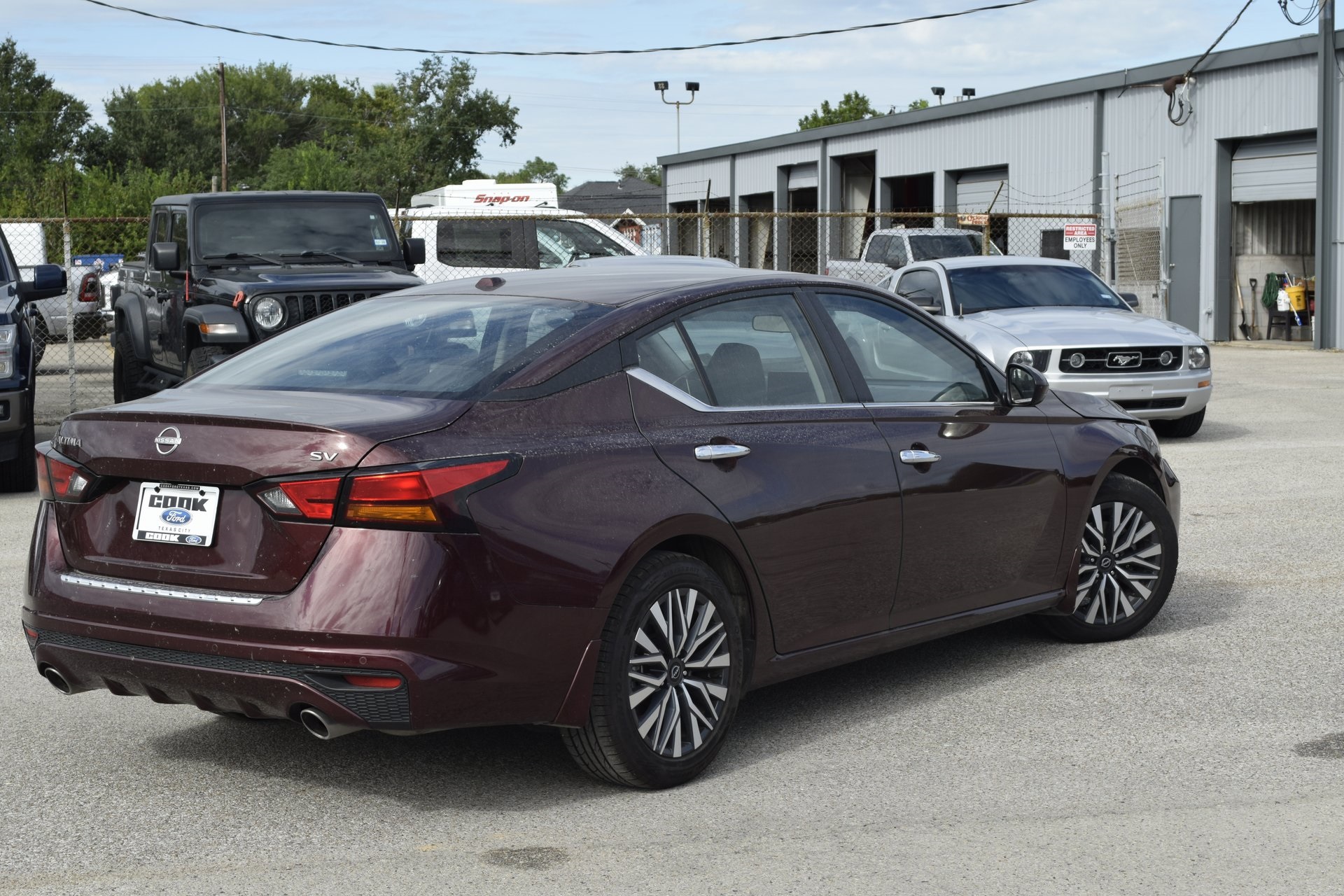2023 Nissan Altima 2.5 SV Red at Classic Elite Chevrolet Hwy 6