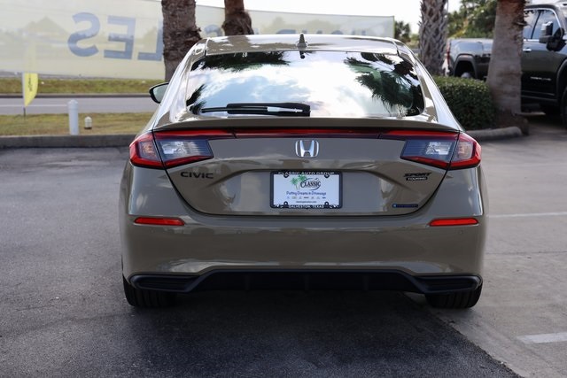 2026 Honda Civic Hybrid Sport Touring Brown at Shottenkirk Kia Fort Bend