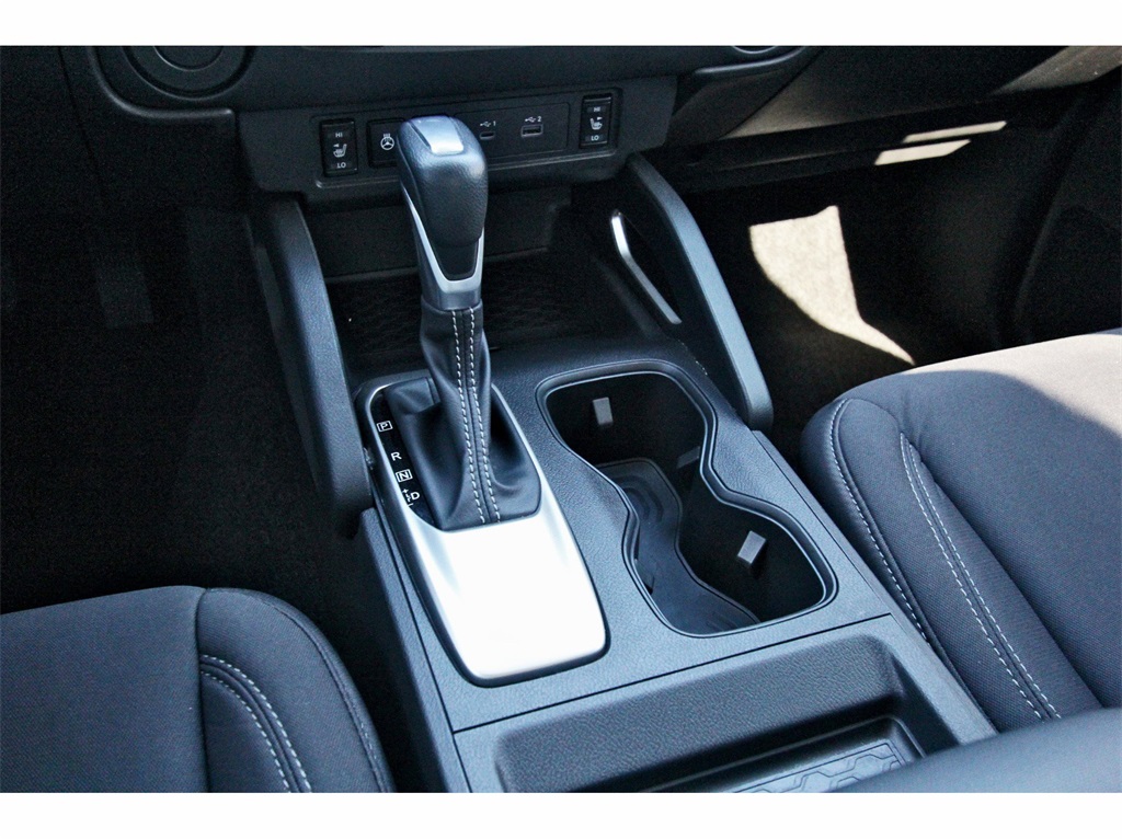 2024 Nissan Frontier SV Red at Central Houston Nissan