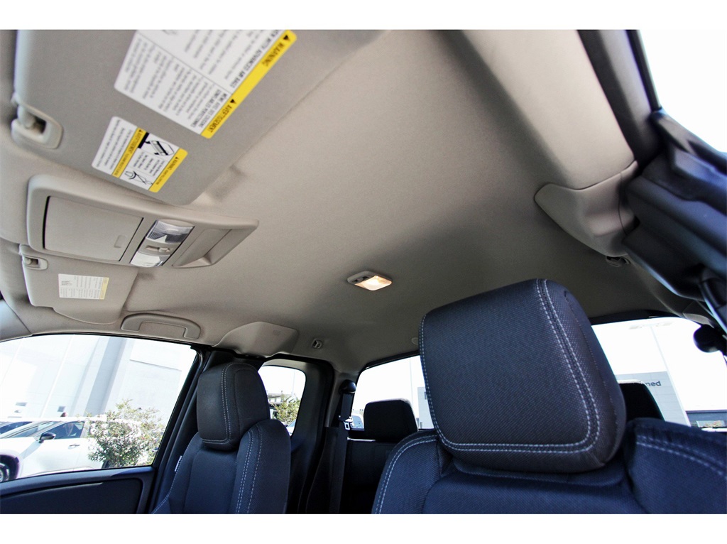 2024 Nissan Frontier SV Red at Central Houston Nissan