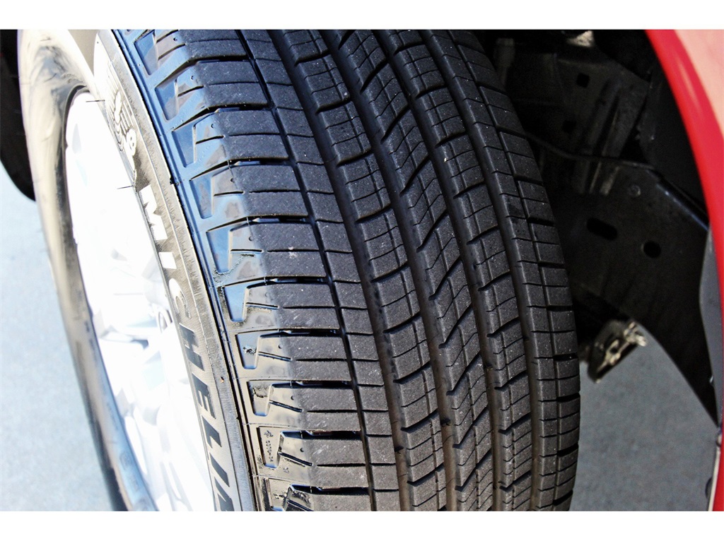 2024 Nissan Frontier SV Red at Central Houston Nissan