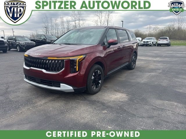Red Metallic 2025 Kia Carnival Hybrid LXS FWD Minivan Front-Wheel Drive 6-Speed Automatic