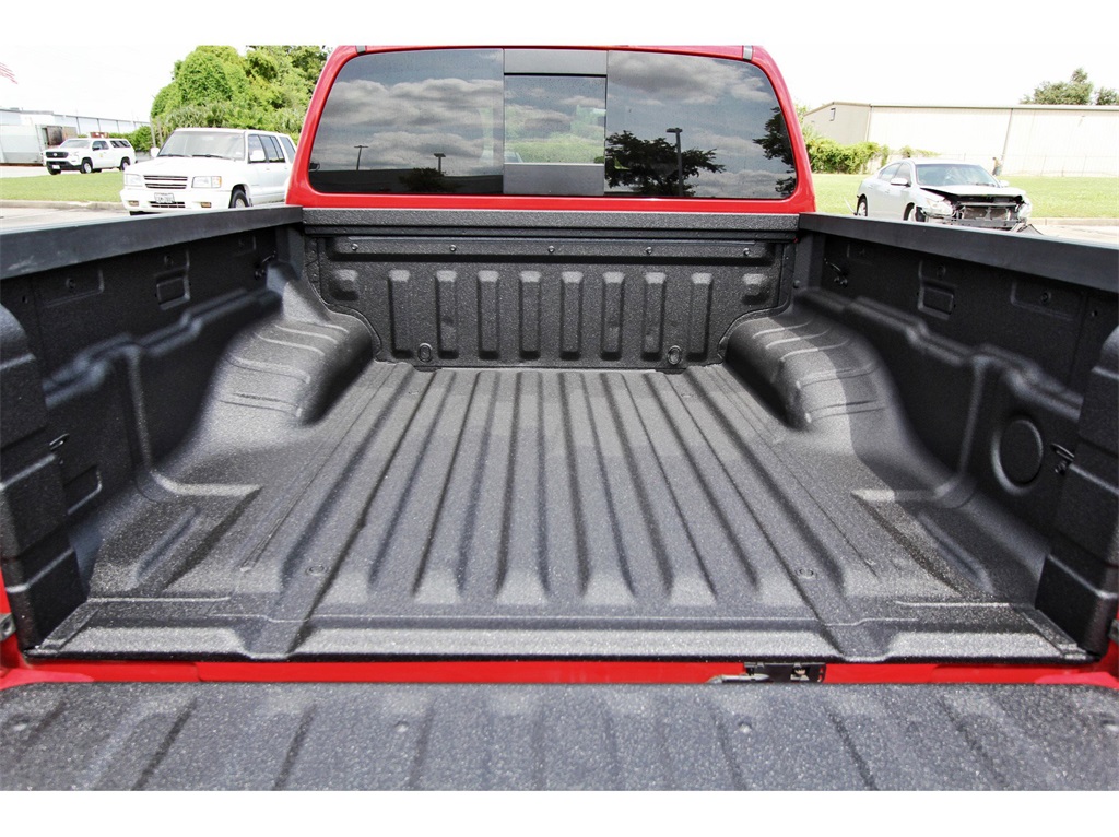 2023 Nissan Frontier PRO-4X Red at South Houston Nissan