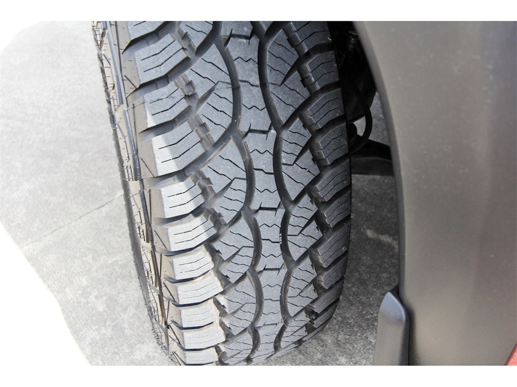 2023 Nissan Frontier PRO-4X Red at South Houston Nissan