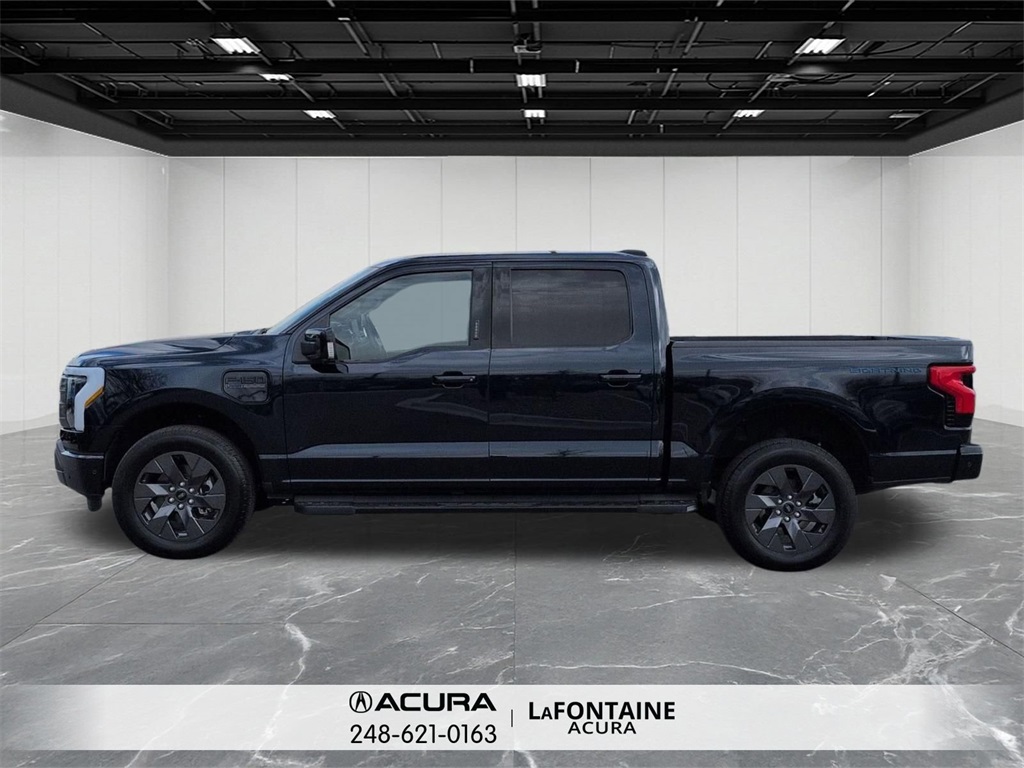 Used 2022 Ford F-150 Lightning Lariat with VIN 1FTVW1EL6NWG15296 for sale in Commerce Charter Township, MI