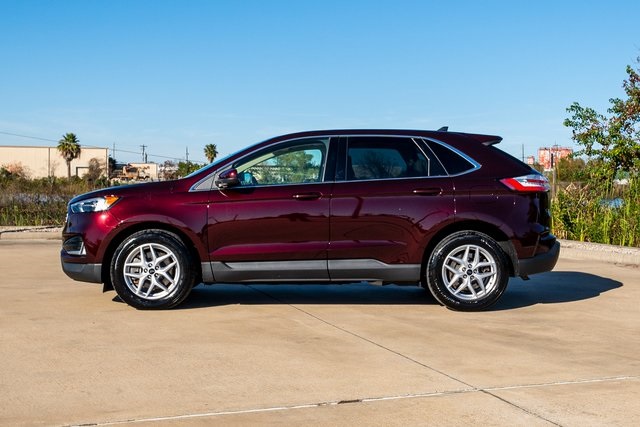 2023 Ford Edge SEL Red at DeMontrond Automotive Group
