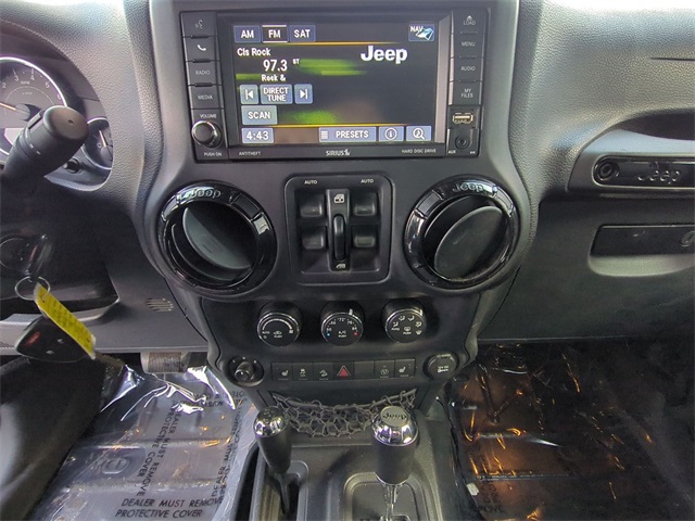 used 2015 Jeep Wrangler car, priced at $19,911