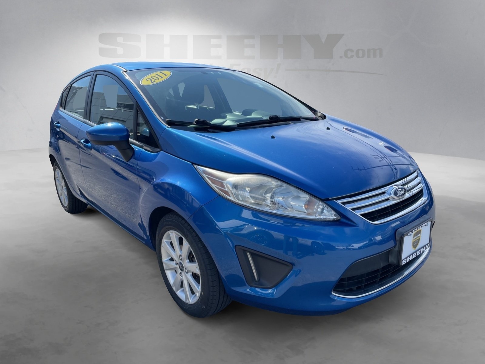Used 2011 Ford Fiesta SE with VIN 3FADP4EJ2BM122841 for sale in Springfield, VA